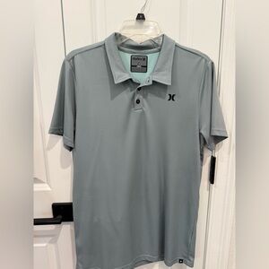 Under Armor polo shirt size M in color grey